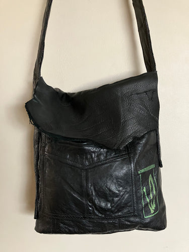Black Satchel bag with Green Bottle of Bones Screen print on Front
